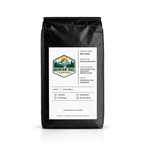 Coffee bag labeled Bali Blue, in matte black packaging with a white label and green mountain logo, featuring tasting notes.